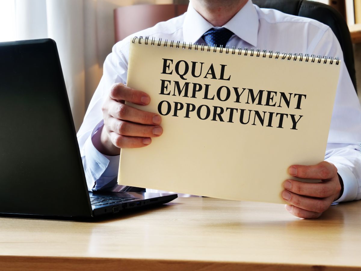 EEO equal employment opportunity. The manager shows the rules and guidelines. qual employment opportunity.